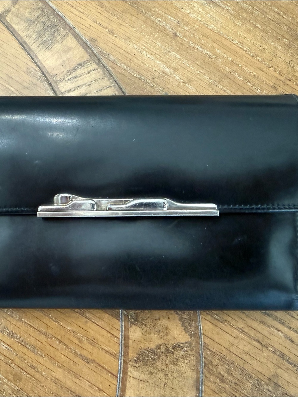 Cartier Black Leather Wallet with Silver Tone Bar